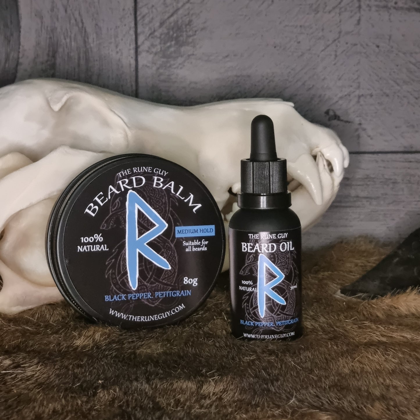 Beard oil and balm with brand logo on a textured surface