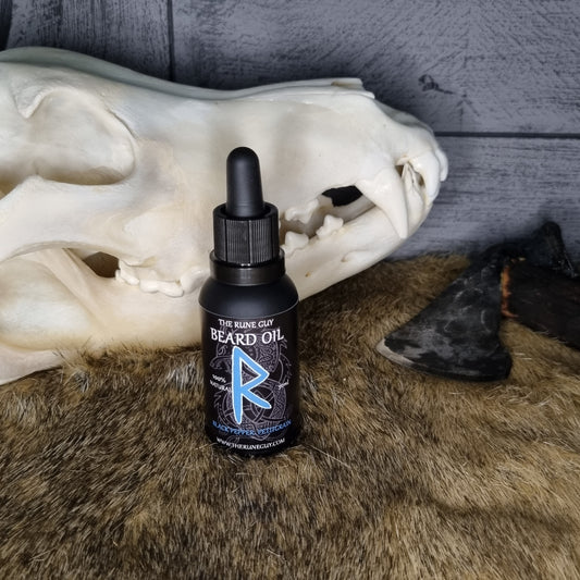 Bottle of beard oil on a skull with fur background